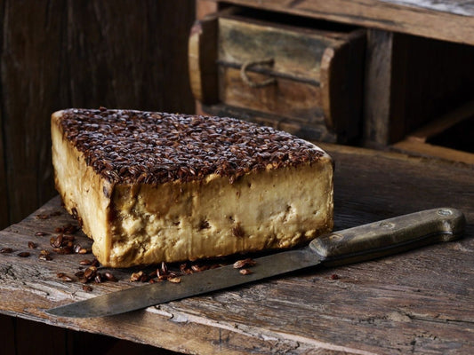 Beppino Occelli has created an original and new cheese, processing goat milk and cow milk together. A few carefully selected wheels are aged for a longer period of time and then coated with malted barley and whisky.