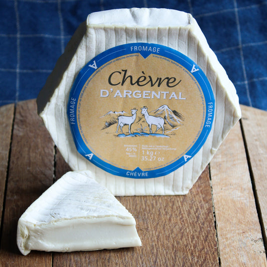 This interior is silky smooth with a gentle, fruity flavour that will develop floral notes with a satisfying oozy texture as it ages.  This unique, hexagonal shaped cheese produced from goat’s milk by Fromagerie Guilloteau is a very attractive addition to any cheese cabinet.