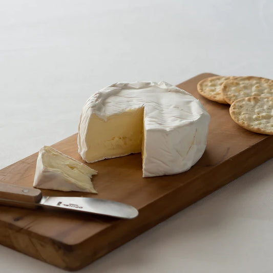 This triple cream brie has a velvety white rind with a glistening interior. When young, it has a smooth, chalky centre and as it matures, the centre breaks down to a decadent, oozing consistency. The texture is creamy with a subtle, buttery finish.
