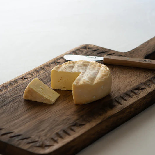 This is a classic washed rind cheese that begins as a white mould. After several weeks of being washed in a brine solution, develops a lovely orange rind and distinct pastoral, earthy aroma. While young the cheese is still mild, but as it ripens, it develops a stronger, more complex smoky flavour with a sweet finish.
