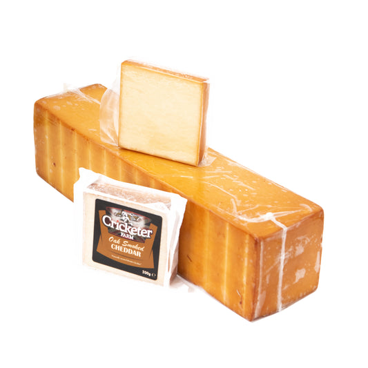 This cheddar has been traditionally cold smoked over oak chips to impart a rich smoky flavour and aroma to the cheese. It is  smooth and firm bodied with an even pale yellow paste and golden-brown rind.