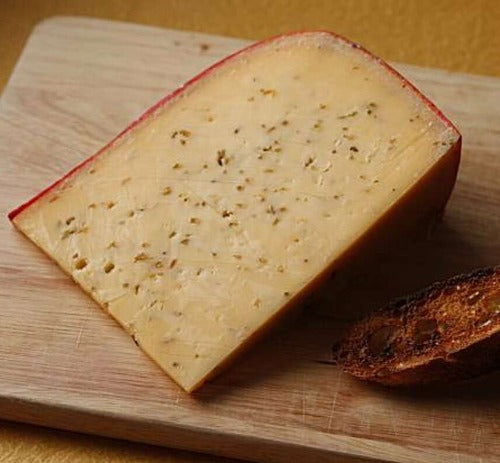 The curd is coloured with annatto and mixed with cumin seeds before being pressed and washed in brine. The cumin provides an enticing aromatic flavour that contrasts well with the creamy, nutty character of the cheese.
