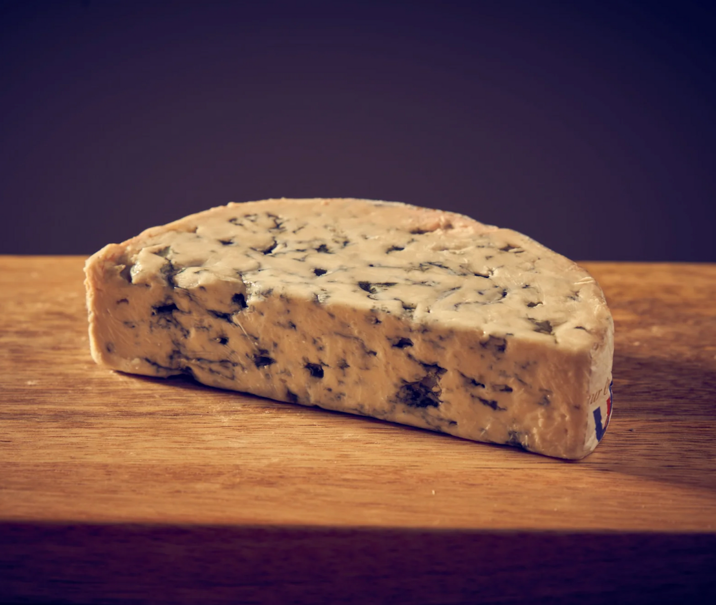 Fourme D'Ambert Cheese. Fourme D'Ambert's unique flavour is milky yet complex with earthy overtones. A luscious cheese with a delicate sweetness, making it a common crowd pleaser. Even those not usually fond of the blue cheese style have been known to enjoy this beauty.