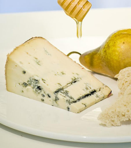 Gorgonzola is probably the most imitated blue cheese in the world. Once made, the cheese is wrapped in foil to retain moisture and after 4 weeks of maturation pierced with spikes to allow air to enter and oxygen loving blue mould to grow. The piccante version of this cheese boasts a firm, fine, smooth paste with a fruity, sharp, pronounced blue flavour and peppery bite that increases with age.
