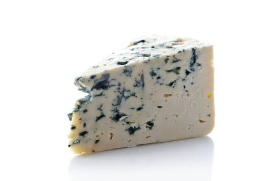Roquefort is a powerful cheese: rich, tangy, and reminiscent of bread and yeast. It crumbles yet is creamy in texture. Moist pockets of blue flavour spring to life on the palate, offering a contrast to the full, creamy paste.
