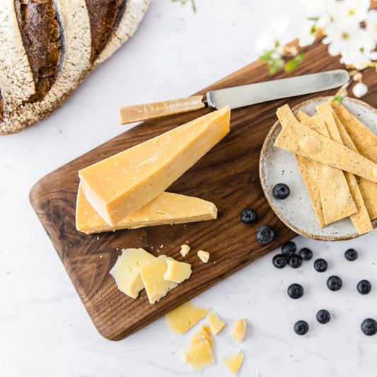 Matured in traditional cheese cloth in a cave-like environment, just like traditional cheddar, but only for approximately 9 months (instead of 12) to develop a rich flavour with earthy characteristics. The resulting cheese has well balanced, mild to mature flavours and a smooth texture.