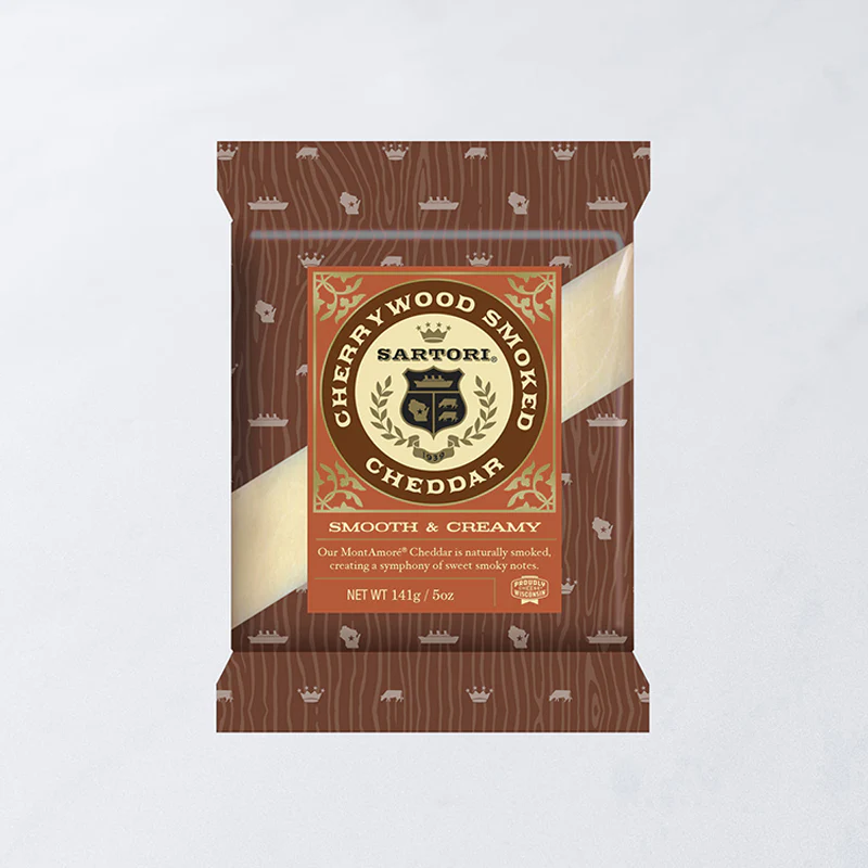 Fruity and tangy Sartori MontAmoré is naturally cold smoked over cherrywood chips to imbue the cheese with subtle sweet and smoky notes. The smoking process lends a slight golden glow to the firm, crumbly curd. The resulting cheese is a harmonious blend of sweet, fruity and smoky notes.