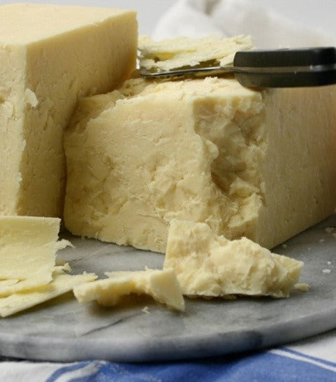 Barber’s Vintage Cheddar is made using traditional starter cultures and the finest West Country milk. A cheese with unrivalled complexity and depth, this cheddar is aged for more than 24 months to create a crumbly texture and full lingering flavour, a true sign of well-aged for cheddar.
