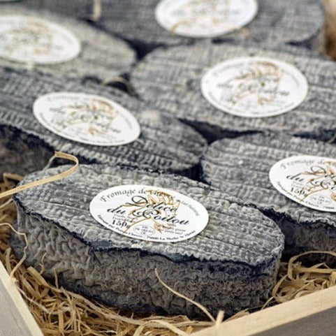 This cheese is made in an oval shape and has a salted charcoal coating making it a standout on a cheese board. The interior is smooth and pristine white with a fine granular texture.   A young Délice des Deux-Sèvres has a fresh, ‘citrusy’ tang on the palate with nutty and yeasty flavours developing as it matures.