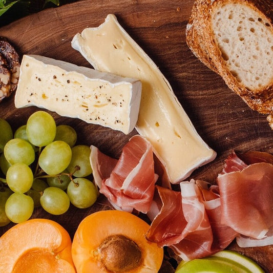 Milk is sourced from local dairies and used to make this triple cream which has a luxuriously rich texture. The white bloomy rind is lovely and fine and the interior is ivory white with a savoury, creamy flavour.