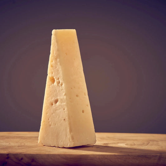 Production is between November and June when milk quality is at its highest. Usually aged for a minimum of 8 months, this cheese is hard and dense with a smooth, hard rind, exhibiting a salty, distinctively rustic flavour. These characters make it very popular as a grating cheese.