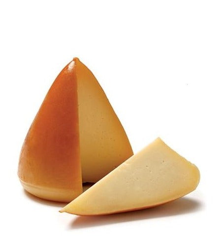 It is matured for a minimum of 45 days and smoked over birch shavings, which imparts a subtle smoky flavour the cheese’s smooth, creamy paste and a golden-brown glow to its firm rind. It has a full but not extreme flavour that is buttery and sweet in the mouth with a smoky aftertaste.