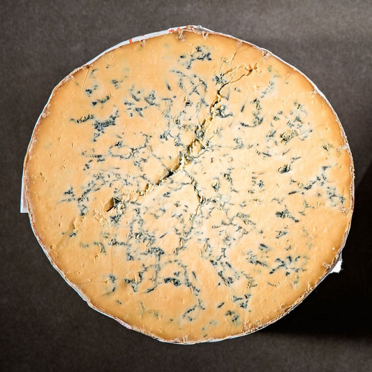 Traditionally made and lovingly matured, this mellow cheese is the pride of the Master Cheesemakers. The perfect Shropshire Blue is a rich orange colour with distinctive deep blue veining and a golden crust. It has a moist, crumbly, and slightly chalky texture with a bold blue flavour.
