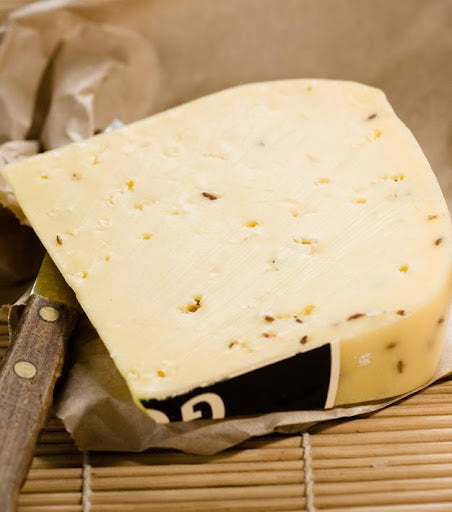 Alexandrina Mt Magnificent Gouda - Spiced. This buttery Jersey milk gouda is typical of the famous Dutch style. It is delicate and creamy on the palate with solid texture and characteristic 'eyes'. This cheese comes spiced with caraway seeds that provide a strong aroma and flavour.