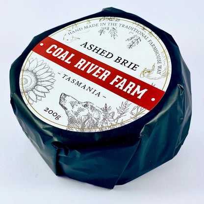 This brie contains a layer of ash in the centre as well as a coating on the outside, making it a striking addition to any cheese board. It has a mild aroma of mushrooms, while the ash adds an extra dimension to create an earthy, nutty finish.