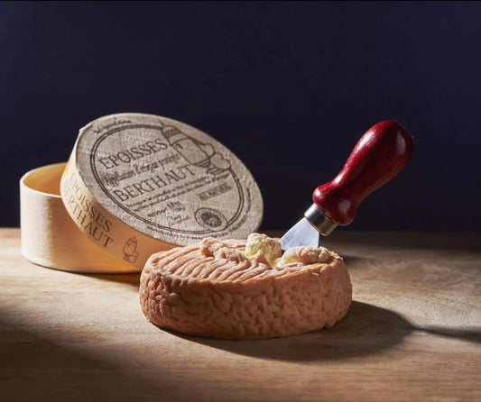 Epoisses has a moist, shiny rind containing an oozing, creamy interior that melts in the mouth. The aroma is powerful but pleasant and the flavour is strong but balanced between savoury, yeasty and salty.