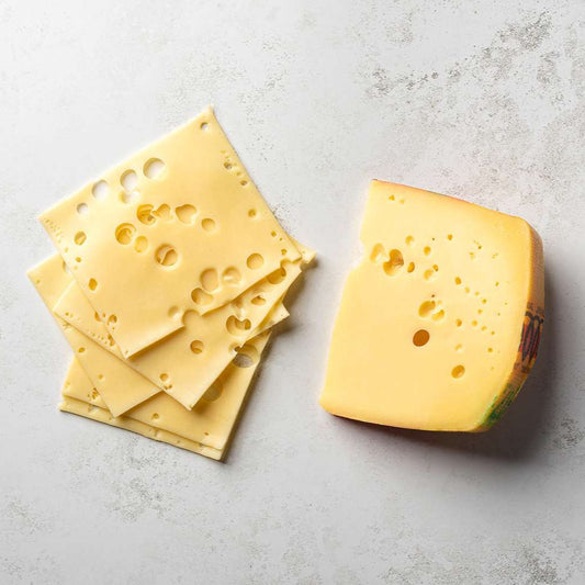 The cheese is mild, like Swiss Emmenthal in style with large irregular holes. It has a yellow wax rind and a supple yellow interior with large characteristic holes. The texture is rich and buttery and the flavour is mild and slightly sweet with a nutty aftertaste.