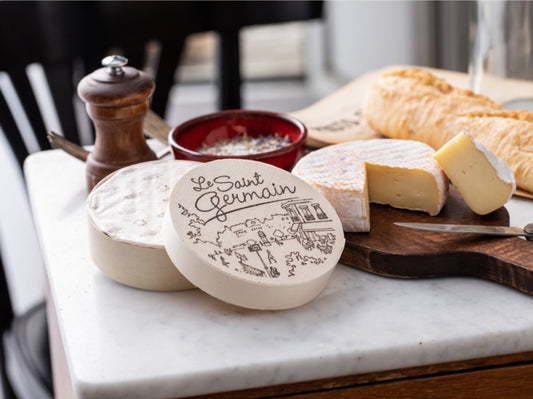 Le Saint Germain is made with quality milk from Montbéliarde cows. It is ripened for a minimum of two weeks and undergoes frequent washing and brushing in this time to develop a lightly sticky orange rind. 