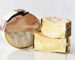 Driftwood is their funky bark-belted soft cheese in the style of Vacherin Mont d’Or. Delicious eaten as is – or baked in its belt like a mini-fondue! With a thin bloomy rind, the paste is creamy and melty, becoming oozy, runny and spoonable as it ages. It is&nbsp;mildly-woodsy, creamy and nutty, becoming stronger in aroma and taste with age.