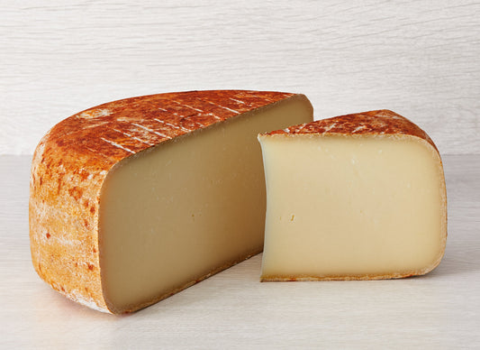 This slightly dry textured cheese still gives way to a creamy, buttery feel in the mouth, and the flavours hint at both herbs and fruit, with more nutty tones.