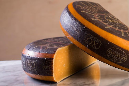 Reypenaer XO has a dark orange paste from its extended ageing with a firm, dry, flaky texture. It has a very complex palate of roasted nuts and salted butterscotch.