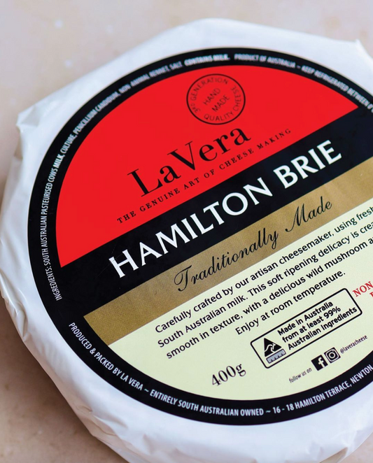 This large format brie uses specially selected South Australian milk to create an ivory paste with a fluffy white bloomy coat of mould that helps develop mild mushroom aromas as it ripens.