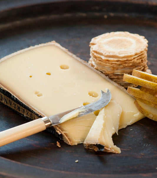 The best wheels of Appenzeller are selected for extra maturation. They are then carefully matured for a further six months to develop more mature flavours and earn the Appenzeller Extra classification.   The natural rind is reddish to dark brown and contains a pale yellow interior with small eyes. The uniquely spicy flavour is a reflection of the secret herbal mix.