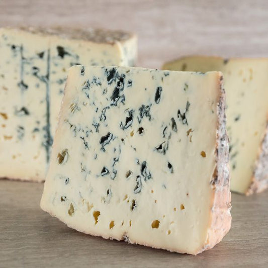 This cheese has a natural rind and an ivory interior with liberal blue-grey veining. The interior is firm yet creamy in texture. As it matures, the crust becomes sticky and starts to develop reddish brown moulds that help to break down the interior, elegantly softening and intensifying the flavour.