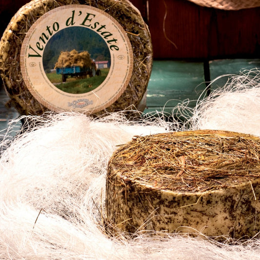 The name Vento d'Estate translates as “summer wind”. The inspiration for this cheese came in 1998 when Antonio was driving with his wife through the mountains following a tractor pulling a wagon of hay. The smell was fantastic, so he stopped the farmer and bought some of the hay. After some experimentation Antonio managed to get the full aroma of the hay into some sheep’s milk cheese, and have since expanded production to make this cows’ milk version as well.